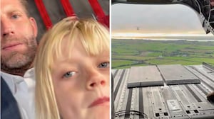 Eric and Luke Trump on a military helicopter.