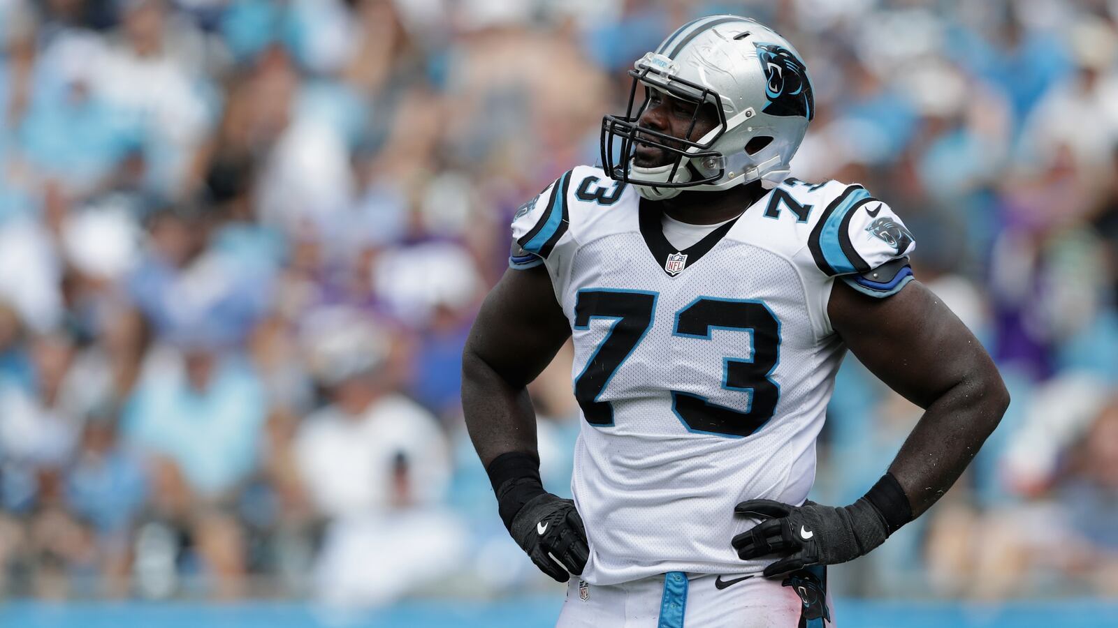 Michael Oher #73 of the Carolina Panthers watches a replay against the Minnesota Vikings in the 3rd quarter during their game at Bank of America Stadium.