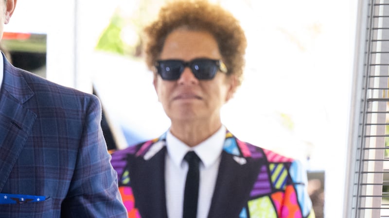 Secretary of Defense Pete Hegseth and his wife, Jennifer Rauchet, arrive to attend the wedding of Dan Scavino, White House Deputy Chief of Staff, and Erin Elmore, the Department of State Director of Art in Embassies, at Mar-a-Lago in Palm Beach, Florida, February 1, 2026.