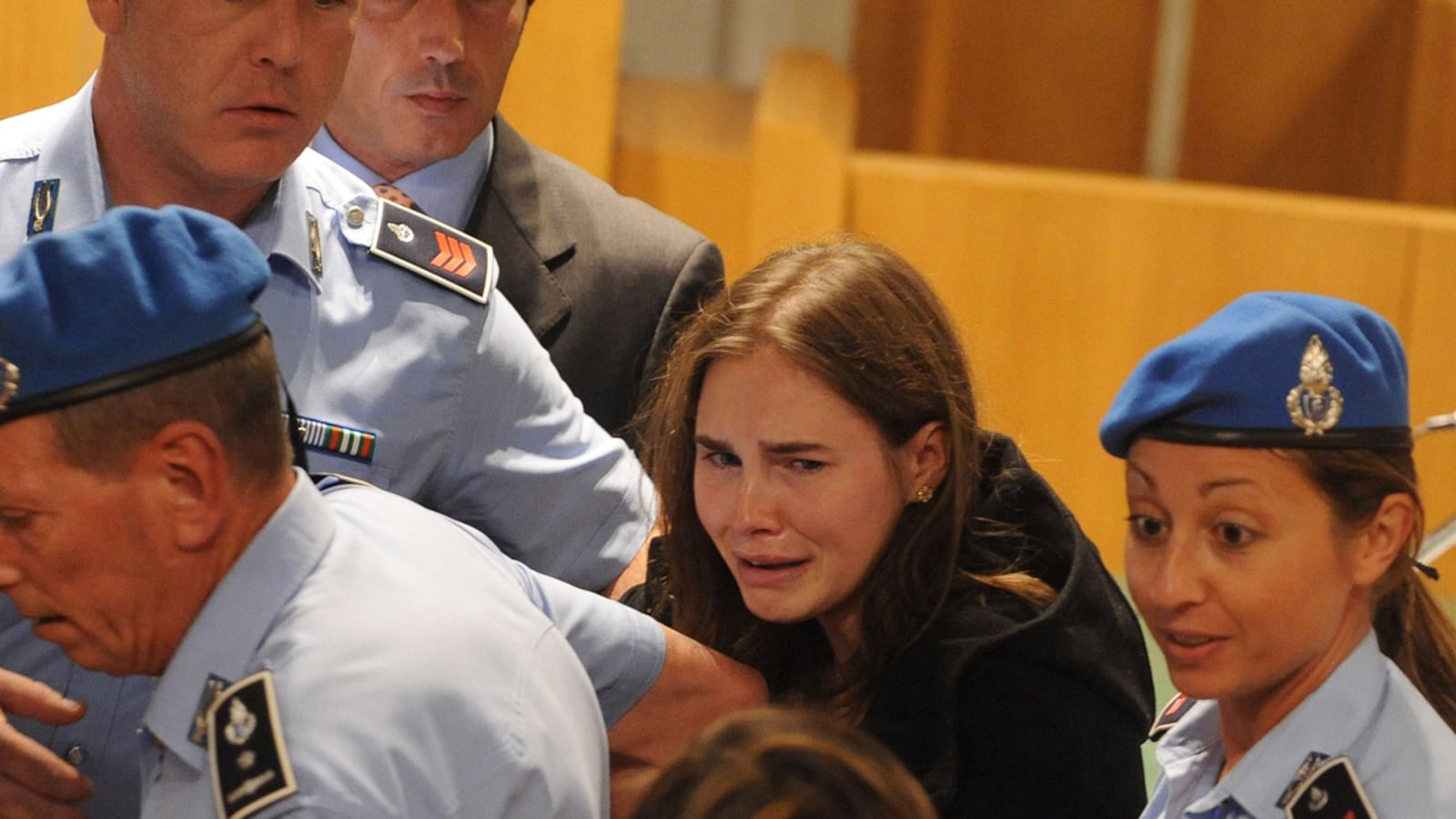 articles/2011/10/03/amanda-knox-leaves-prison-a-free-woman-after-judge-orders-her-release/knox-released-nadeau_xqrzma