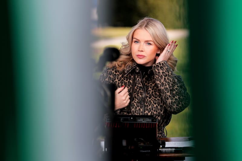 White House Press Secretary Karoline Leavitt participates in a television interview outside the White House on December 16, 2025 in Washington, DC.