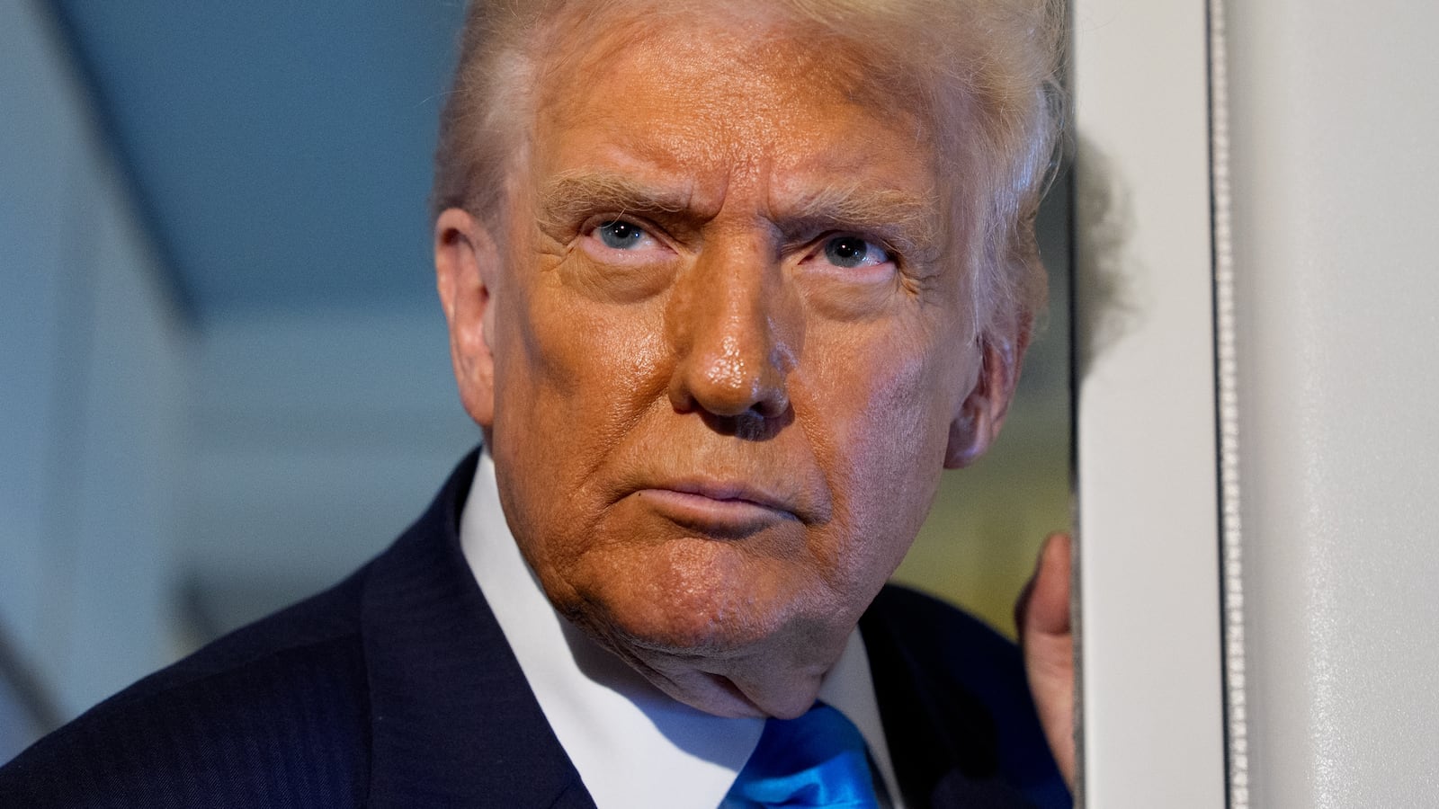 TOKYO, JAPAN - OCTOBER 29: U.S. President Donald Trump speaks to journalists aboard Air Force One en route to South Korea on October 29, 2025 in Japan. Trump is traveling to South Korea for the APEC meetings, following an appearance at the ASEAN summit in Malaysia, and a trip to Japan, where he called on Japanese Emperor Naruhito and new Prime Minister Sanae Takaichi. (Photo by Andrew Harnik/Getty Images)