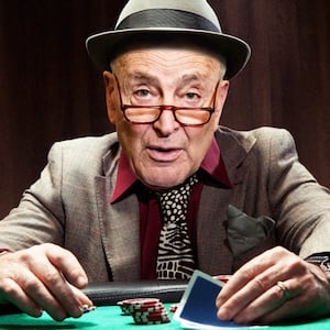 A photo illustration of Sen. Chuck Schumer playing poker.