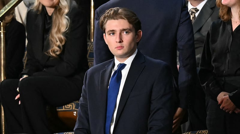 Barron Trump, son of US President Donald Trump, stands before the arrival of President Trump for the State of the Union address in the House Chamber of the US Capitol in Washington, DC, on February 24, 2026.