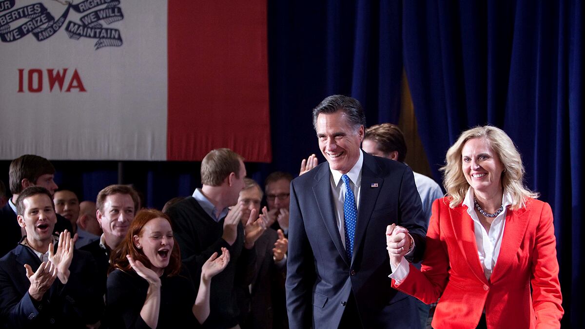 cheats/2012/01/04/romney-and-santorum-tied-in-iowa/gop-contenders-campaign-in-iowa-mitt-anne-romney-caucus-night_c8knzb