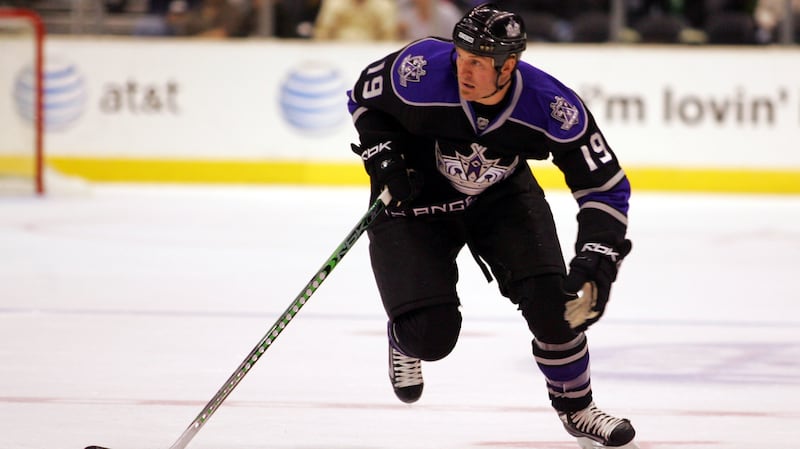 Los Angeles Kings left wing Kyle Calder (19) skates the puck up ice against the Columbus Blue Jackets during the first period at the Staples Center in Los Angeles, CA.