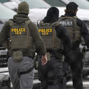 ICE agents depart the Bishop Henry Whipple Federal Building on February 4, 2026 in Minneapolis, Minnesota.