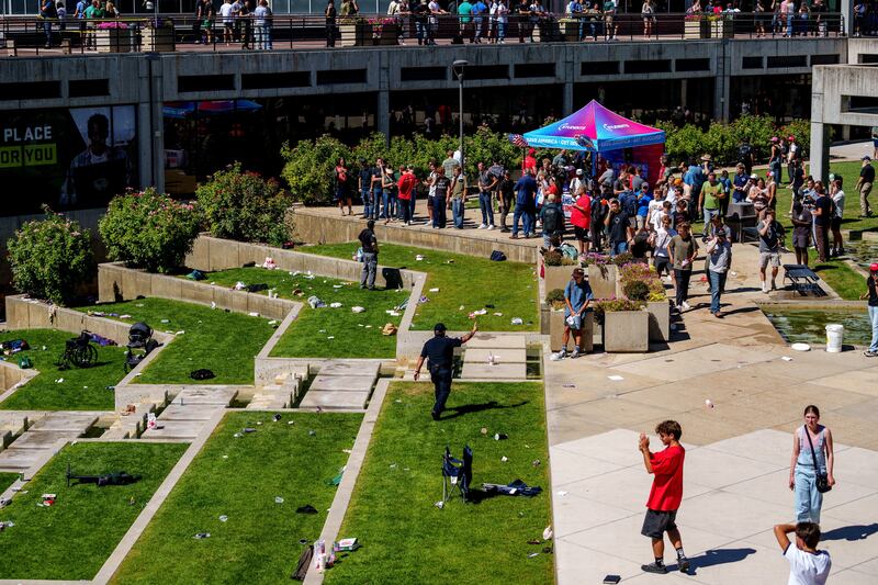 The scene after right-wing activist and commentator Charlie Kirk was shot at a Utah Valley University speaking event in Orem, Utah, on Sept. 10, 2025.