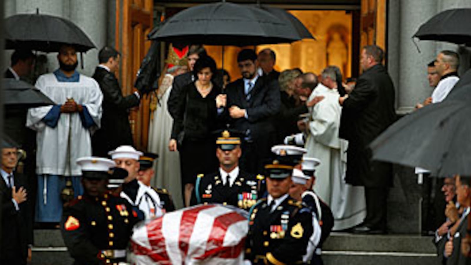 articles/2009/08/29/our-teddy-changed-america/clymer-funeral_46235_rqco7e