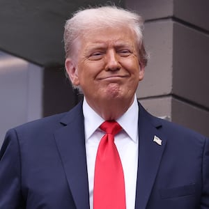 U.S. President Donald Trump reacts as he arrives prior to the Men's Singles Final match between Jannik Sinner of Italy and Carlos Alcaraz of Spain on Day Fifteen of the 2025 US Open at USTA Billie Jean King National Tennis Center in New York City.