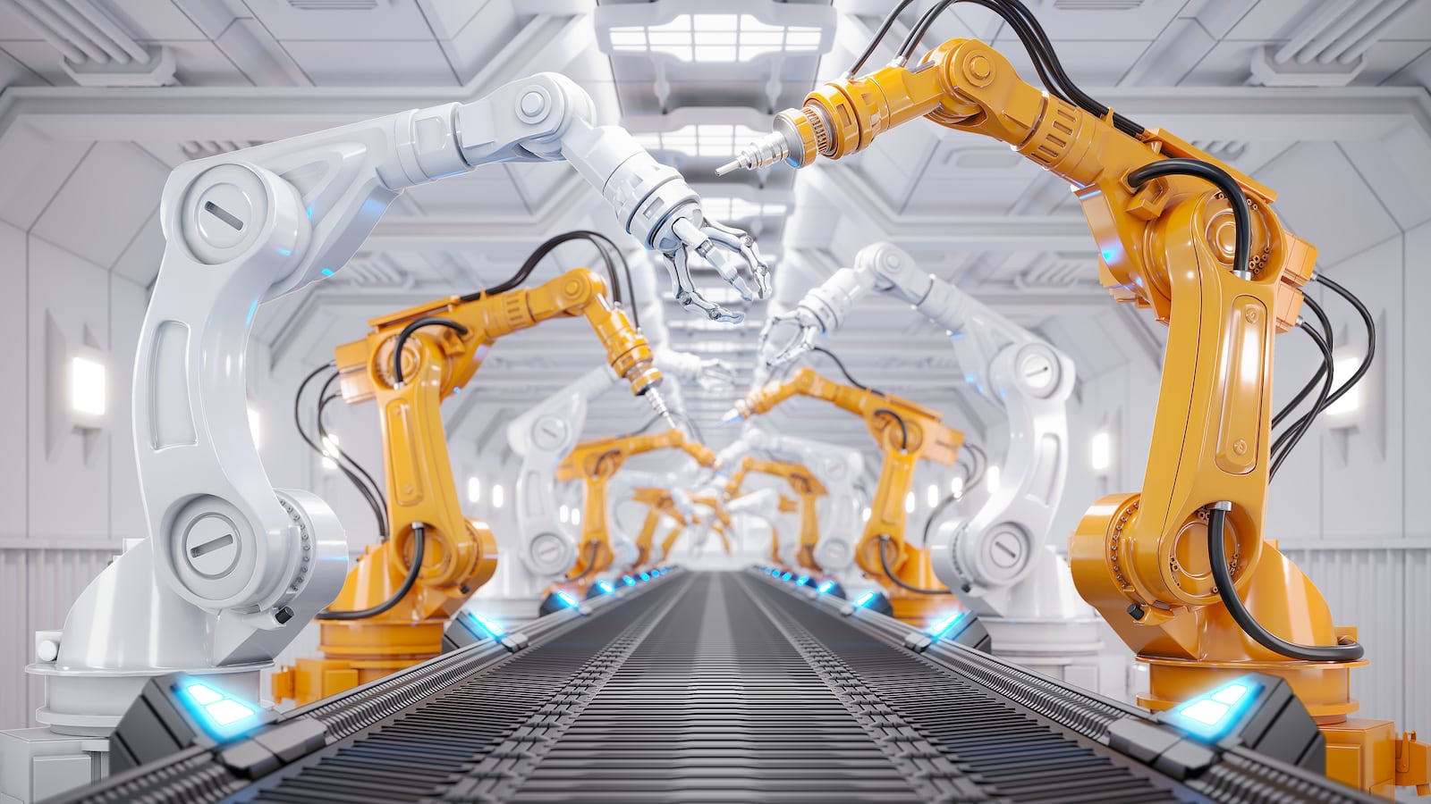 Robotic arms and a conveyor belt