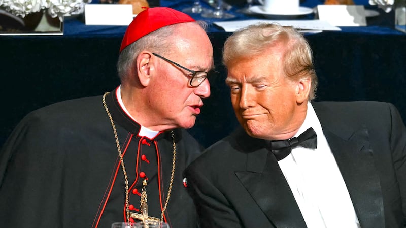 Donald Trump speaks with Archbishop of New York Timothy M. Dolan at the 79th Annual Alfred E. Smith Memorial Foundation Dinner at the Hilton Midtown in New York, October 17, 2024.