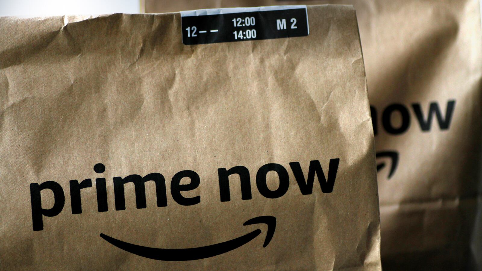 Amazon Prime Now delivery bags are seen in this illustration photo July 27, 2017.