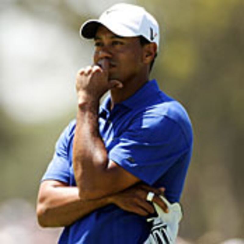 articles/2009/12/02/tigers-ferocious-drive/depaulo-tiger-woods_66536_jeqpwz