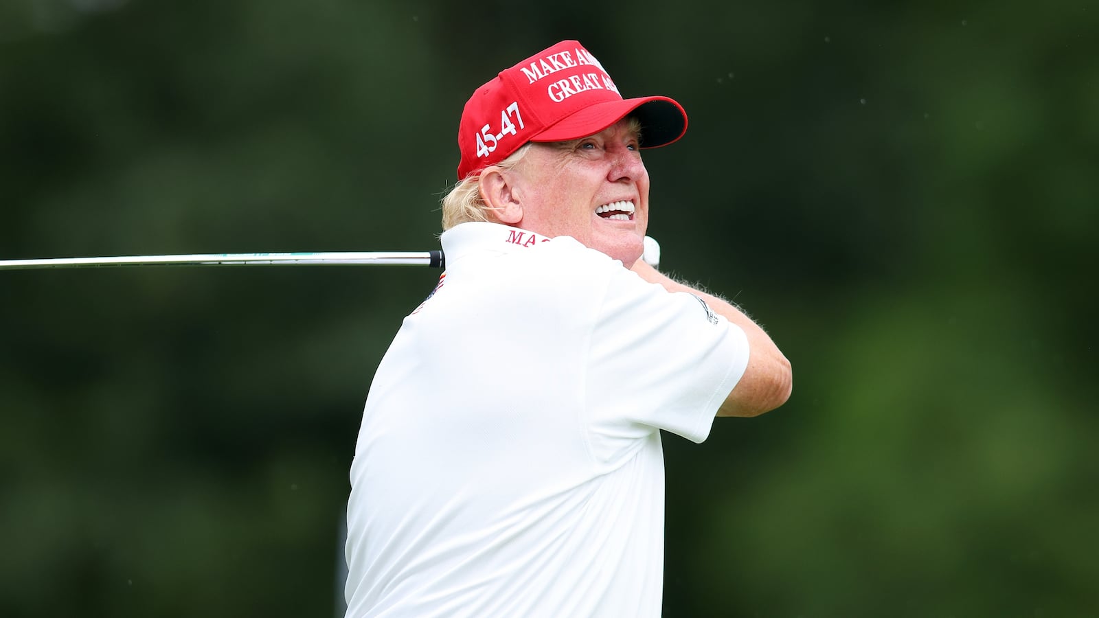 BEDMINSTER, NEW JERSEY - AUGUST 10: Former President Donald Trump follows his tee shot on the 3rd tee during the pro-am prior to the LIV Golf Invitational - Bedminster at Trump National Golf Club on August 10, 2023 in Bedminster, New Jersey. (Photo by Mike Stobe/Getty Images)