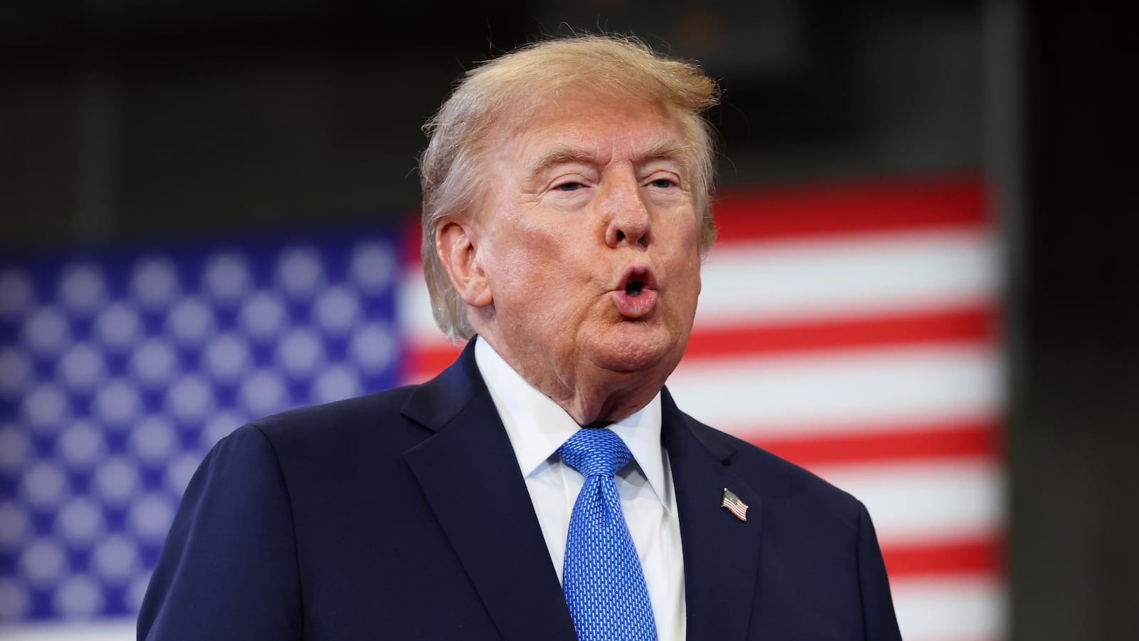 President Donald Trump arrives to deliver remarks on August 14, 2026 in Garden City, New York.