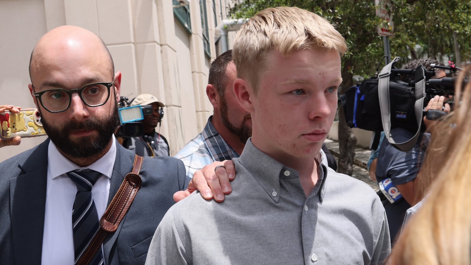 Accused murder of stepsister, Timothy Hudson, leaves courtroom.