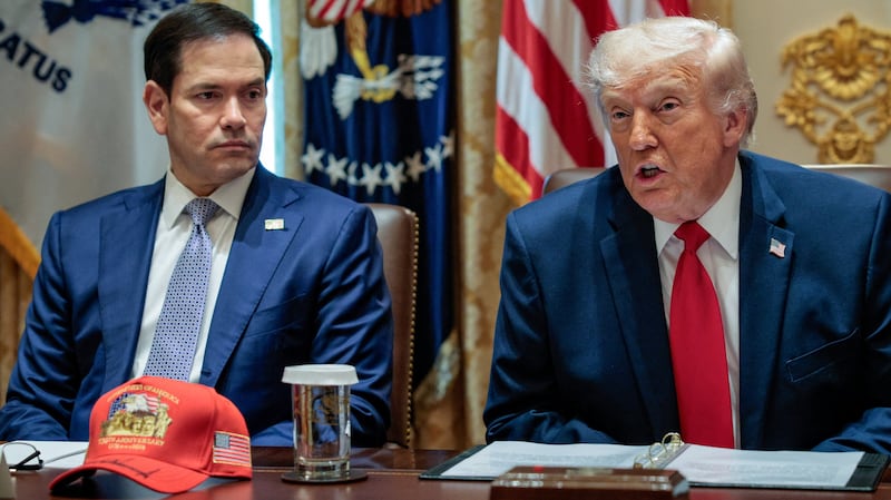 U.S. President Donald Trump speaks next to Secretary of State Marco Rubio during a cabinet meeting in the Cabinet Room at the White House, in Washington, D.C., U.S., May 27, 2026. REUTERS/Evan Vucci