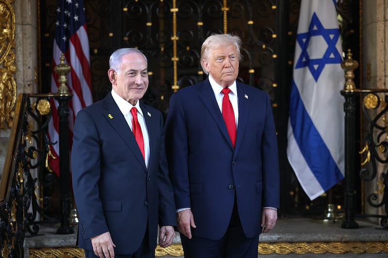 PALM BEACH, FLORIDA - DECEMBER 29: U.S. President Donald Trump welcomes Israeli Prime Minister Benjamin Netanyahu to his Mar-a-Lago club on December 29, 2025 in Palm Beach, Florida. The two leaders are scheduled to hold a bilateral meeting to discuss regional security in the Middle East as well as the U.S.-Israel partnership.  (Photo by Joe Raedle/Getty Images)