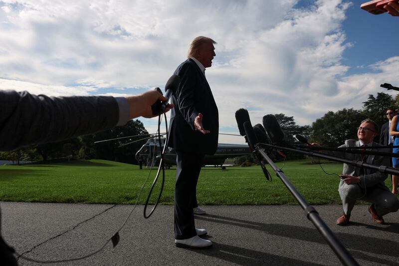 Donald Trump wears golf shoes as he boards Marine One for travel to New York to attend the Ryder Cup golf tournament, from the White House in Washington, D.C. on September 26, 2025