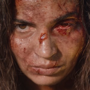 Souheila Yacoub as Alice.