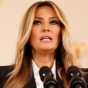 First lady Melania Trump departs after delivering a statement in the Grand Foyer at the White House on October 10, 2025 in Washington, DC.