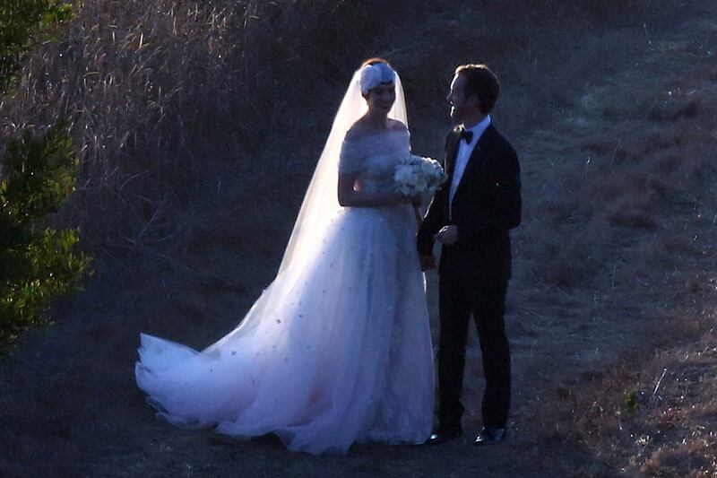 articles/2012/09/30/anne-hathaway-s-wedding-to-adam-schulman-valentino-wedding-dress-big-sur-celebration/anne-hathaway-wedding_rmzoj0