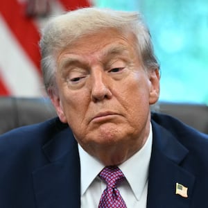 President Donald Trump speaks to reporters after signing executive orders in the Oval Office of the White House in Washington, DC on September 5, 2025.