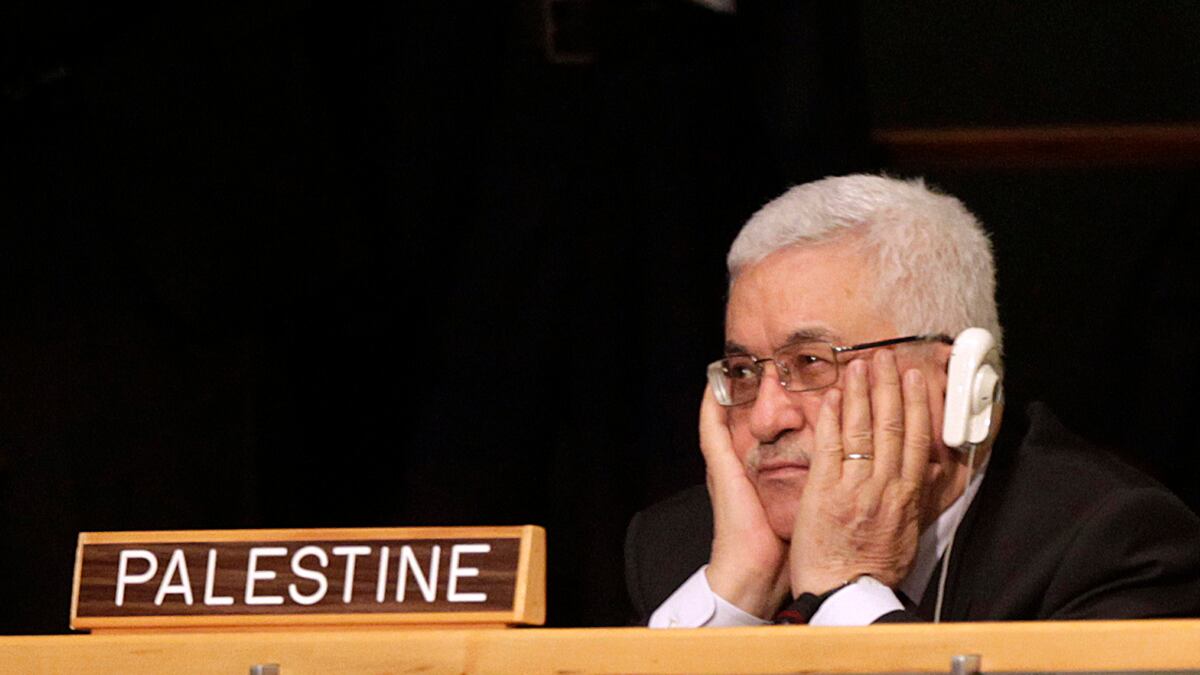 cheats/2011/09/21/palestinians-may-delay-u-n-bid/mahmoud-abbas-un-headphones-cheat_jsp7mv