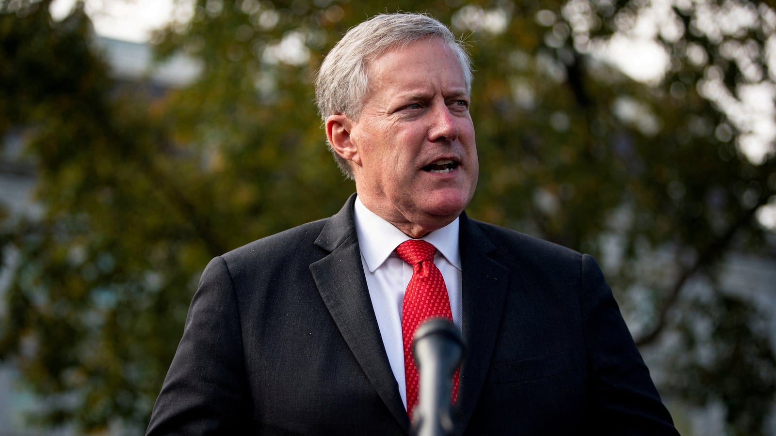 Staff Mark Meadows speaks to reporters following a television interview, outside the White House in Washington, U.S. October 21, 2020.