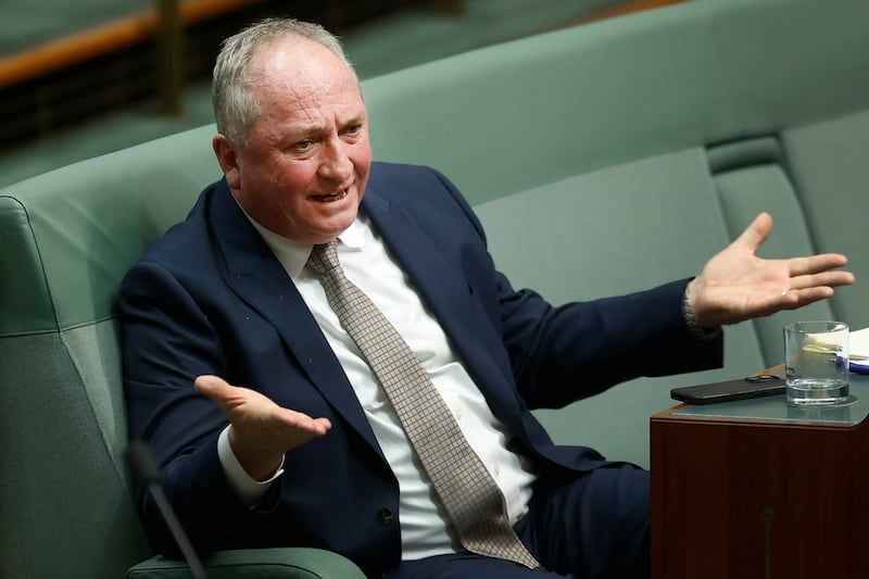 CANBERRA, AUSTRALIA - MAY 12: One Nation member for New England Barnaby Joyce reacts during Question Time in the House of Representatives at Parliament House on May 12, 2026 in Canberra, Australia. The Labor government's budget for 2026 is expected to focus on cost-of-living relief, housing affordability, and defence spending, as Treasurer Jim Chalmers faces pressure to deliver economic stability ahead of a federal election cycle. (Photo by Hilary Wardhaugh/Getty Images)