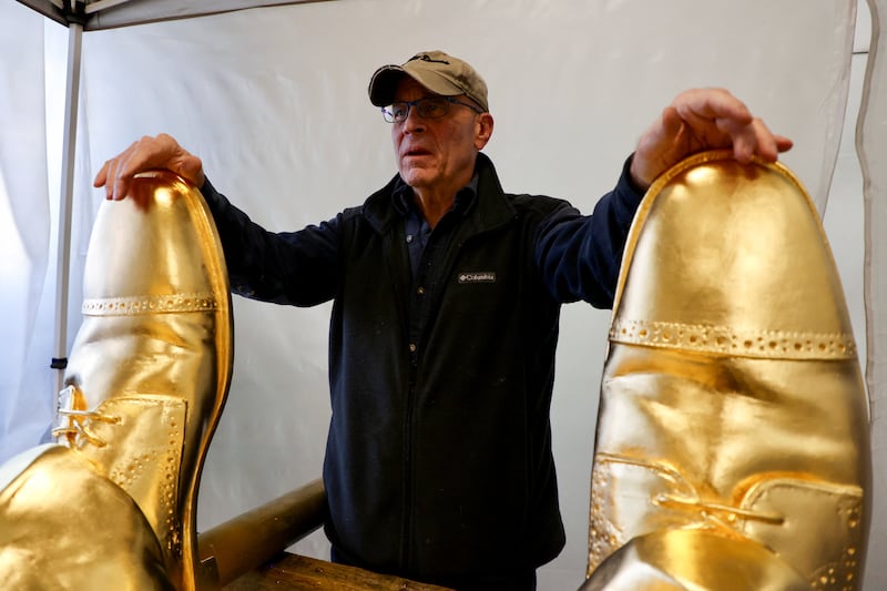 Alan Cottrill with the statue.