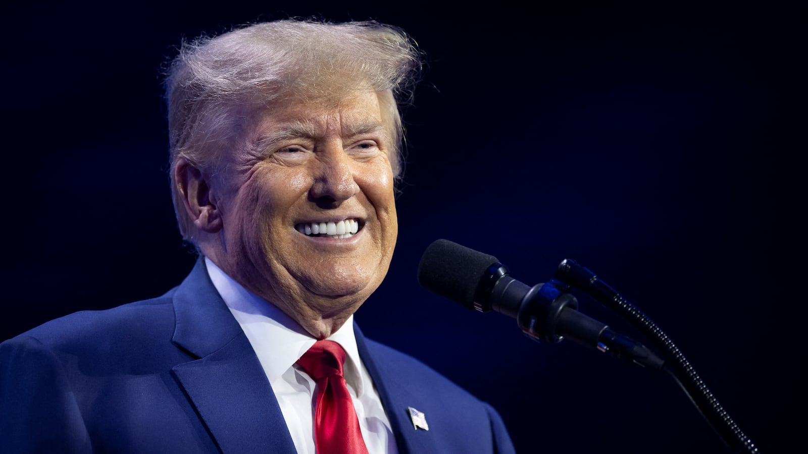 Former U.S. President and Republican presidential candidate Donald Trump smiles as he speaks during the Turning Point Action Conference in West Palm Beach, Florida, U.S. July 15, 2023.