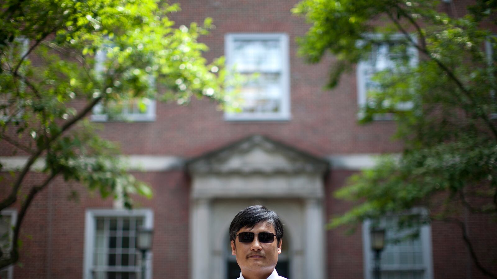articles/2013/07/09/after-a-tense-year-nyu-and-chen-guangcheng-part-ways/130702-rogin-guangcheng-tease_dpdu03