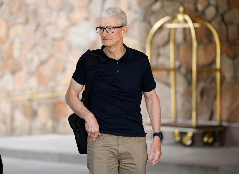 Apple CEO Tim Cook wore a plain black shirt to the conference and an Apple watch on his wrist.