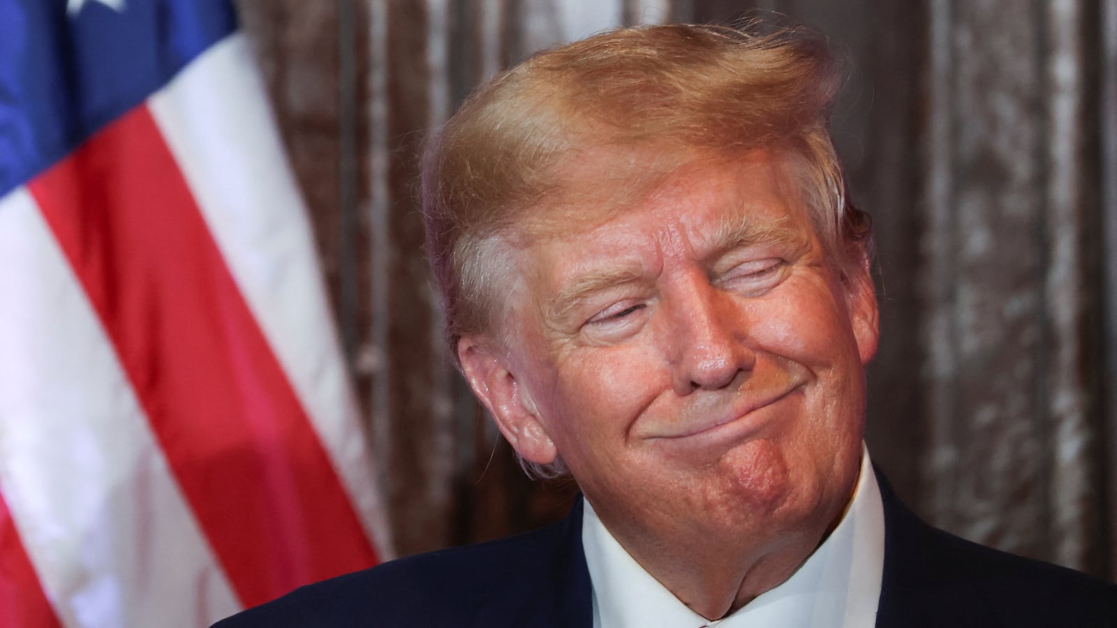 Donald Trump reacts during a campaign stop to unveil his leadership team, at the South Carolina State House in Columbia, South Carolina, Jan. 28, 2023.