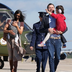 US Vice President JD Vance is escorted to board Air Force Two with his wife Usha and children Mirabel and Alec, on the day of his travel to Alaska, at Joint Base Andrews, Maryland, US, October 5, 2026. Jacquelyn Martin/Pool via REUTERS