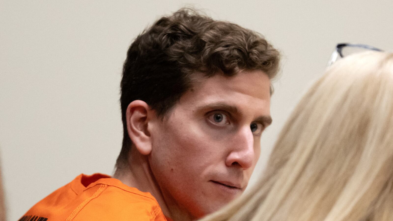 Bryan Kohberger (left) looking at his attorney Anne Taylor (right) during a court hearing.