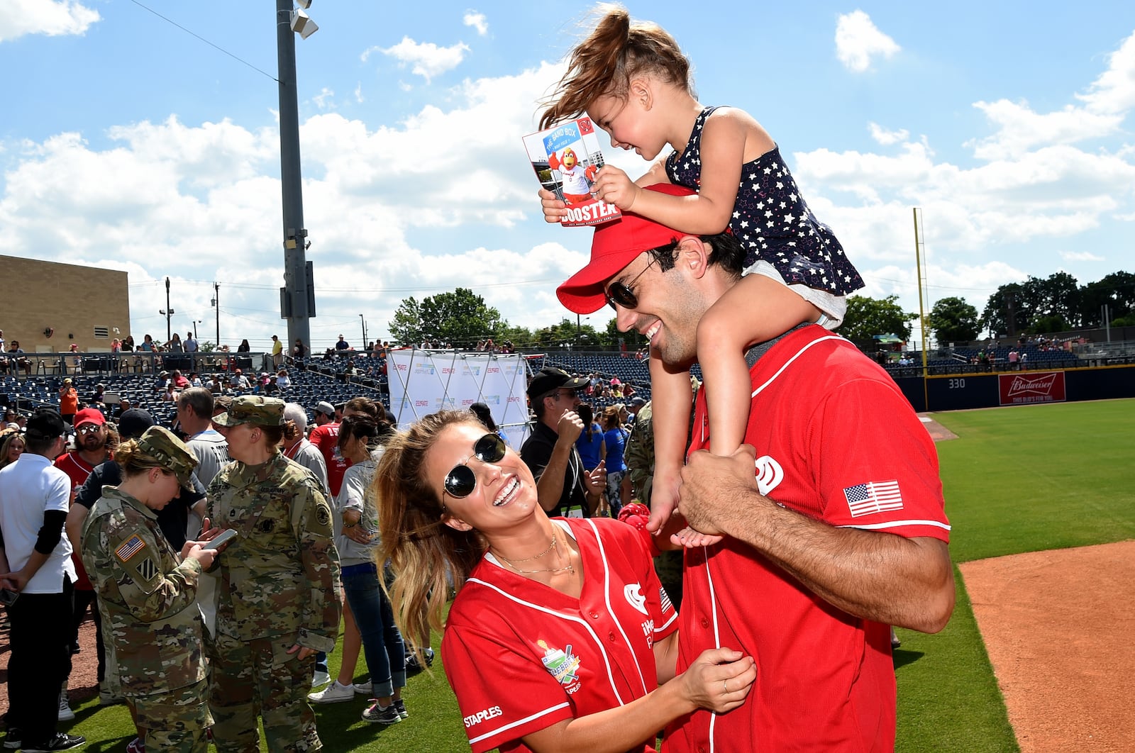 NASHVILLE, TN - JUNE 10: Singer-songwriter Jessie James Decker, NFL player Eric Decker, and their daughter Vivianne Rose Decker attend the 27th Annual City of Hope Celebrity Softball Game at First Tennessee Park on June 10, 2017 in Nashville, Tennessee. (Photo by Rick Diamond/Getty Images for City Of Hope)