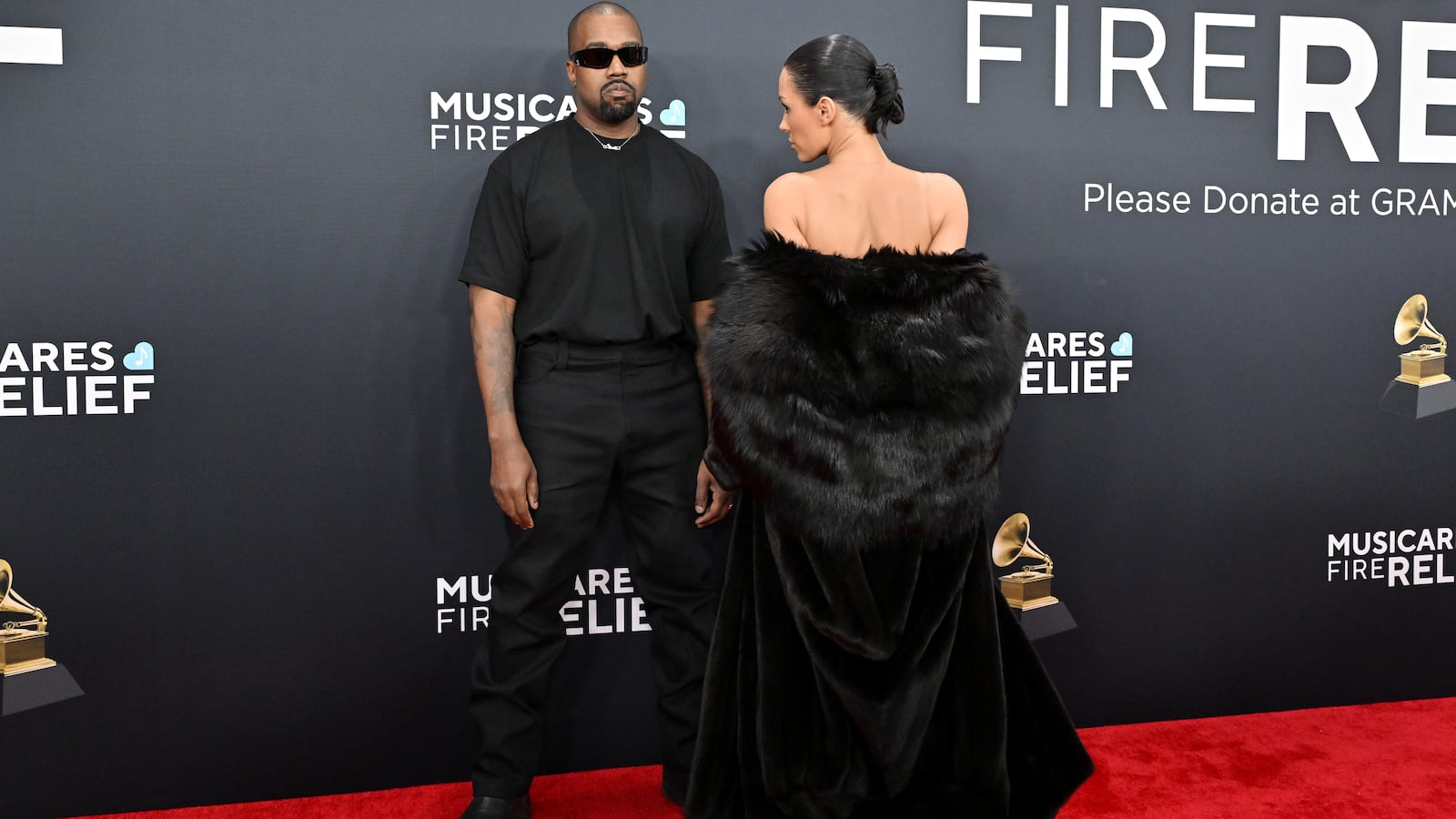 LOS ANGELES, CALIFORNIA - FEBRUARY 02: (FOR EDITORIAL USE ONLY) (EDITOR'S NOTE: Image contains nudity) Kanye West and Bianca Censori attend the 67th GRAMMY Awards at Crypto.com Arena on February 02, 2025 in Los Angeles, California.