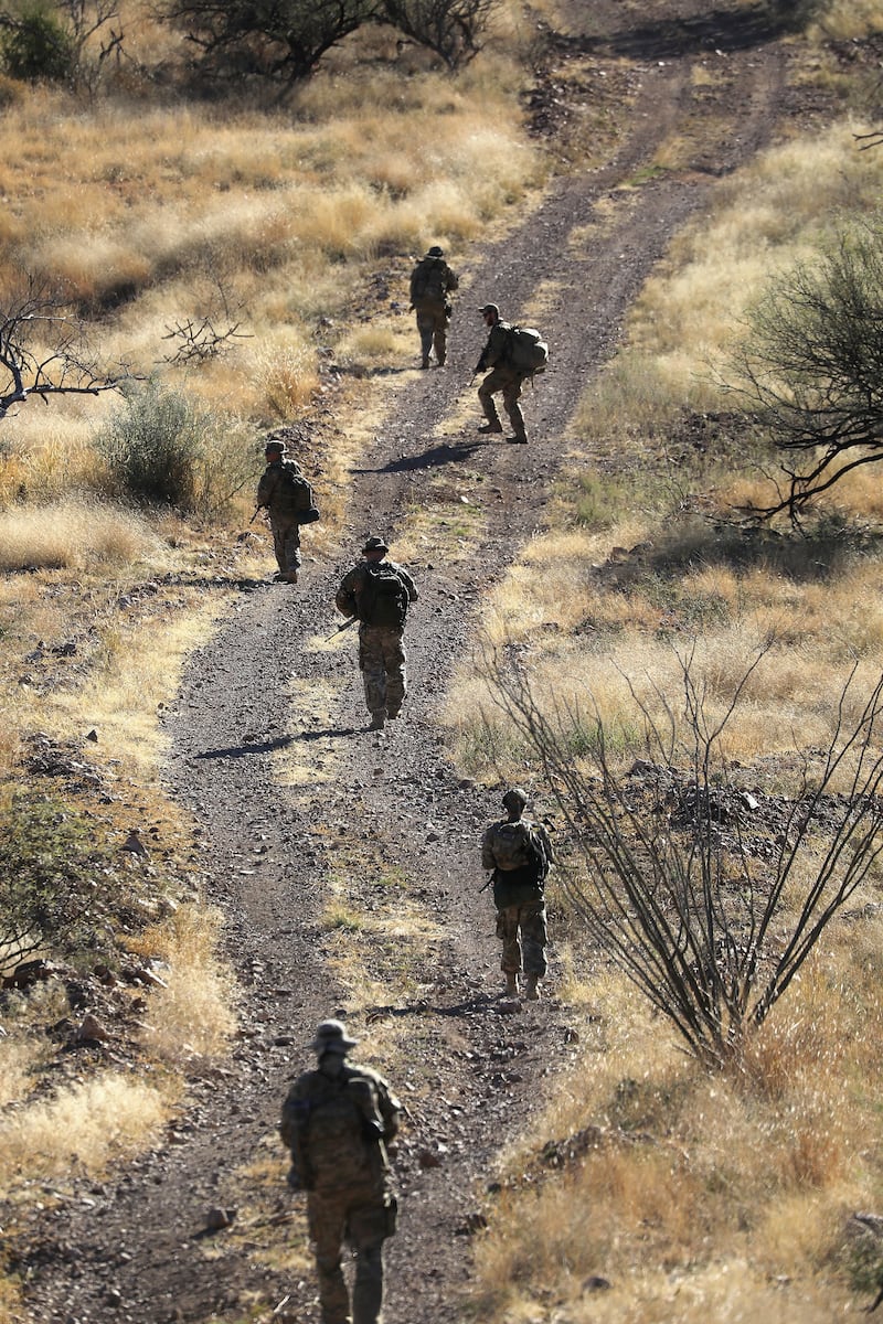 Civilian paramilitaries, part of the “Arizona Border Recon,” patrol for migrants in an area near Arivaca, Arizona, in 2016.