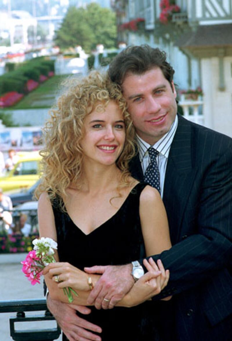 galleries/2012/09/05/tom-cruise-more-stars-with-reportedly-arranged-marriages-photos/famous-arranged-marriages-travolta-preson_okbote