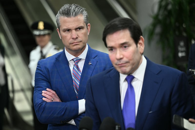 Defense Secretary Pete Hegseth looks on as Secretary of State Marco Rubio speak to the media before he forced him aside to yell at a reporter from CNN.