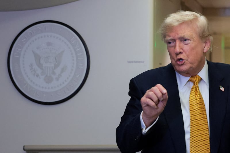 U.S. President Donald Trump speaks to reporters mid-flight in the press cabin of the new, Qatari-gifted Air Force One after changing planes to return to Washington from RAF Mildenhall, Britain, July 8, 2026.