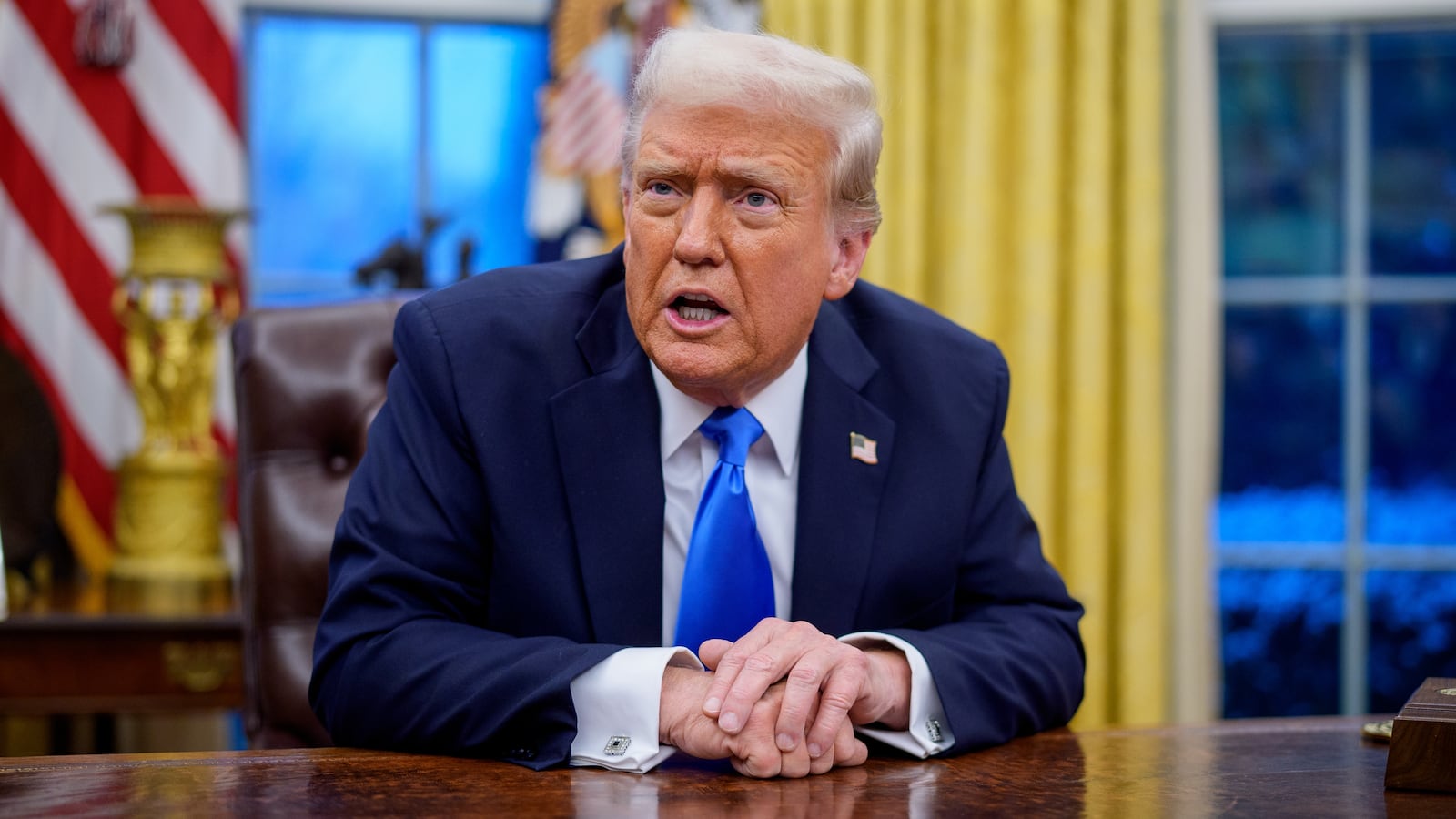 President Donald Trump speaks during an executive order signing in the Oval Office in February.
