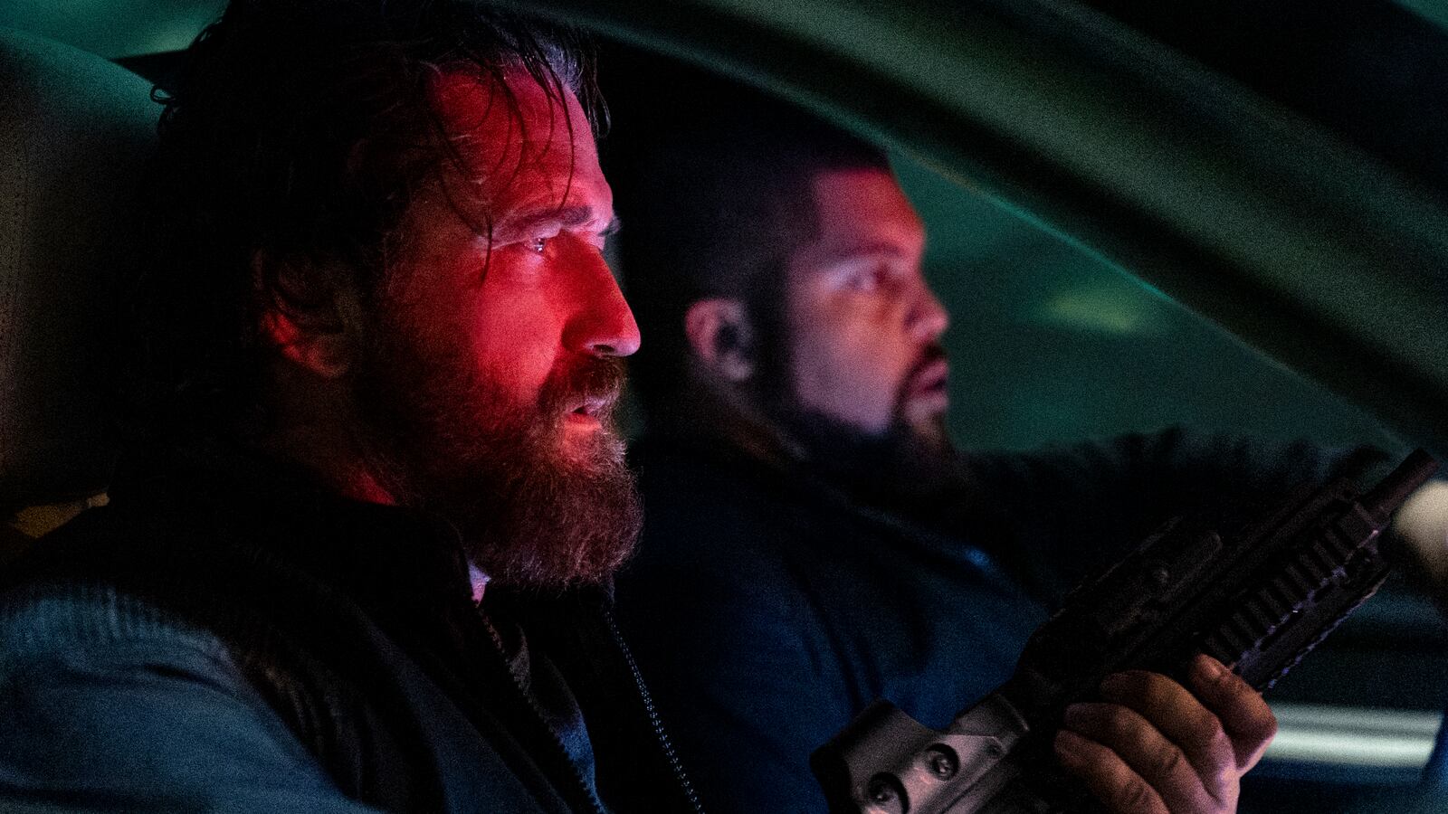 Gerard Butler as 'Big Nick' O'Brien and O’Shea Jackson Jr. as Donnie Wilson in Den of Thieves 2: Panthera.