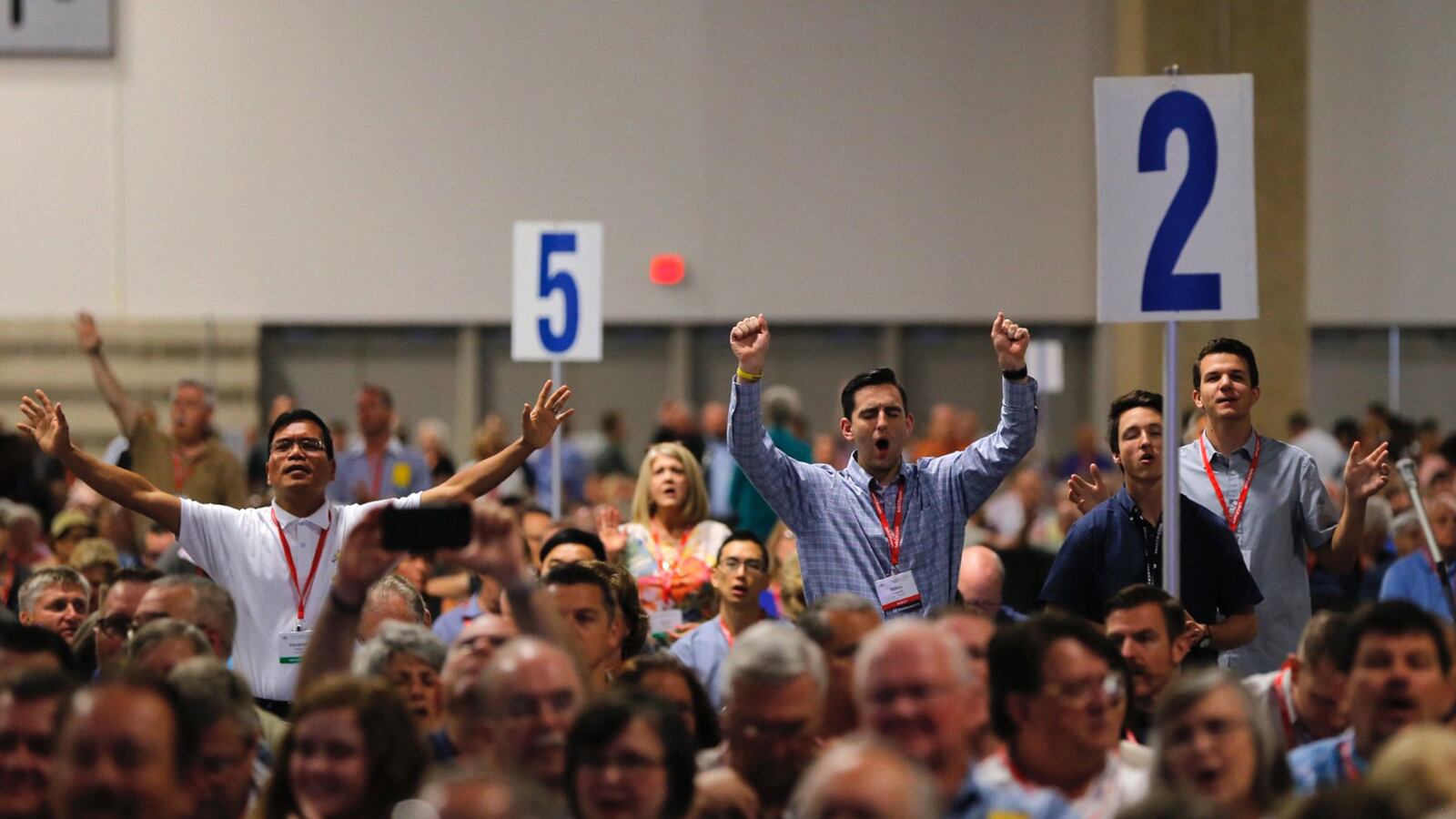 Messengers pray and worship during music prior to a sermon by Dr. Steve Gaines, the current president, on Tuesday, June 12, 2018 at the 2018 annual meeting of the Southern Baptist Convention in Dallas, Texas.