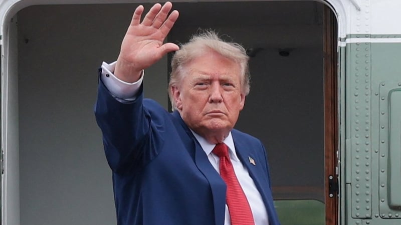 U.S. President Donald Trump waves as he boards Marine One as he departs SPIRE Academy, en route to Cleveland Hopkins International Airport, in Geneva, Ohio, U.S., August 11, 2026.