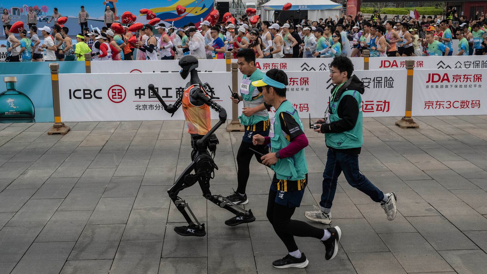 A humanoid robot competes in the Beijing E-Town Humanoid Robot Half Marathon, 2025.