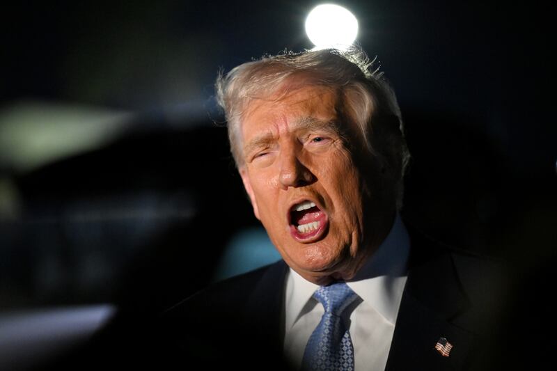U.S. President Donald Trump speaks to reporters before boarding Air Force One on November 16, 2025 at Palm Beach International Airport in West Palm Beach, Florida.